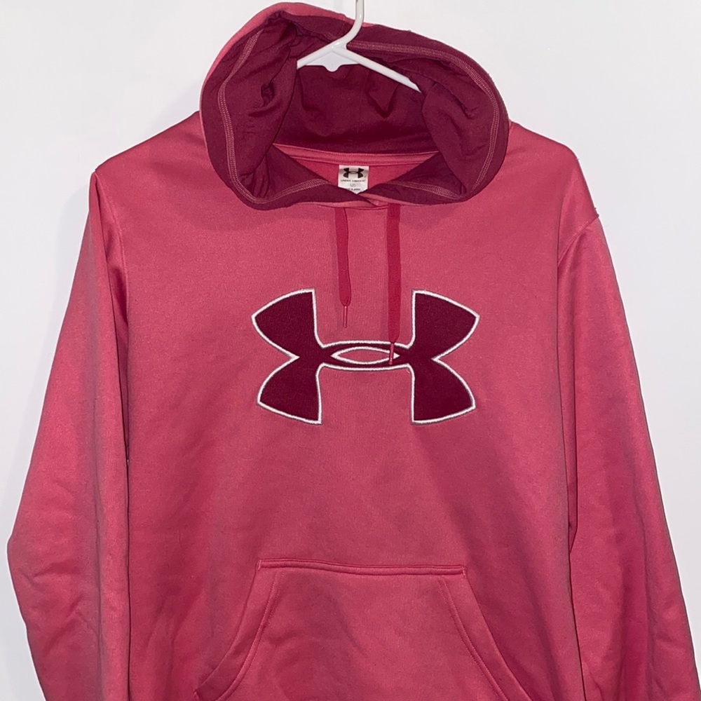 Pink UnderArmor hoodie. Size M. Good condition.